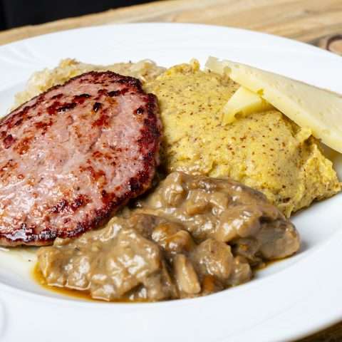 Polenta from Storo with beef and pork sausage